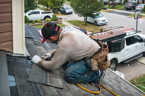 Professional Roofing technician working in Elmsford, NY